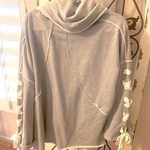 NWOT BOUTIQUE OVERSIZED SWEATSHIRT with EMBELLISHMENTS.